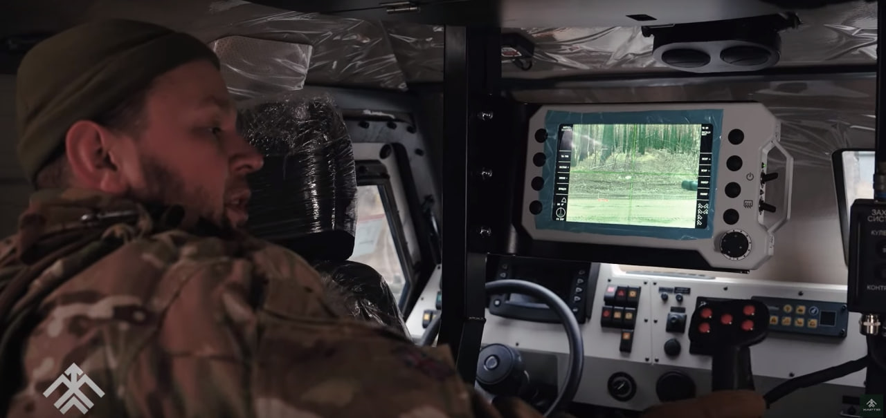 A soldier of the Khartiia brigade in the gunner's seat inside Oncilla / Defense Express / Mobility, Firepower of Oncilla APC in Reviews of Ukrainian National Guard Soldiers