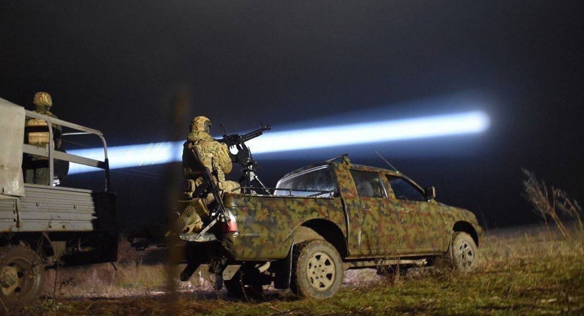 A mobile group of the Ukrainian military, equipped with a heavy machine gun with a projector, repels a night attack by kamikaze drones, Defense Express