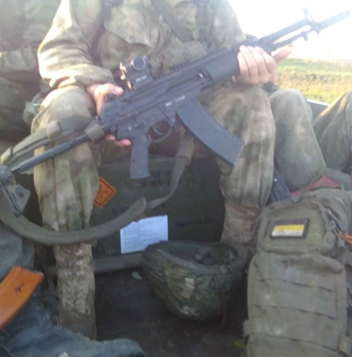 russian soldier in Ukraine holding an A-545 rifle