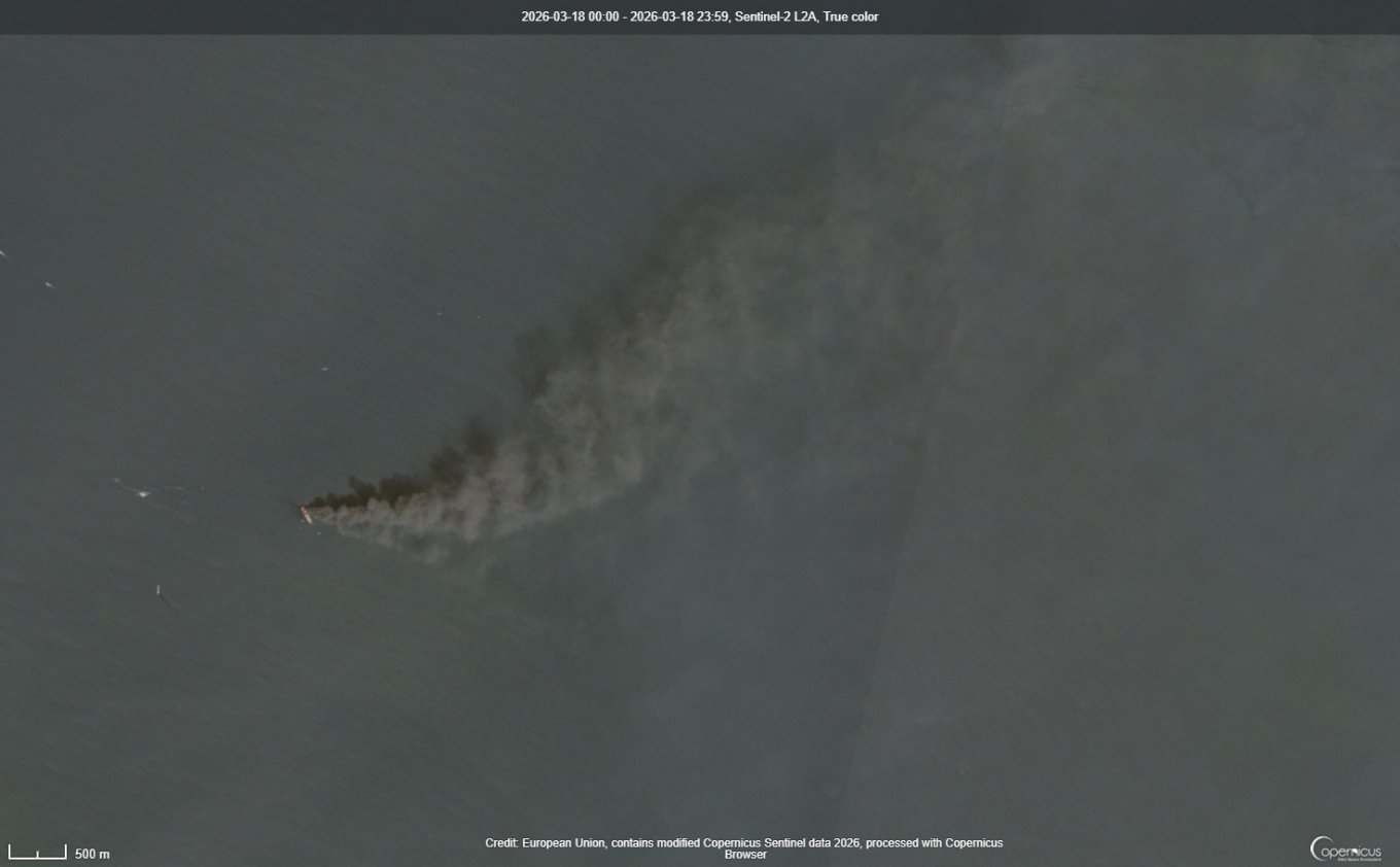 Burning tanker in Strait of Hormuz
