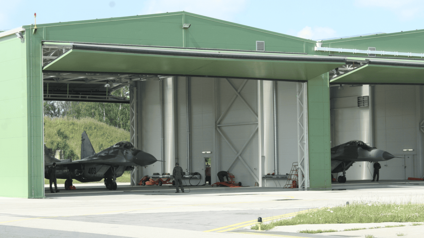 Polish MiG-29s in hangars at a military base in Lithuania