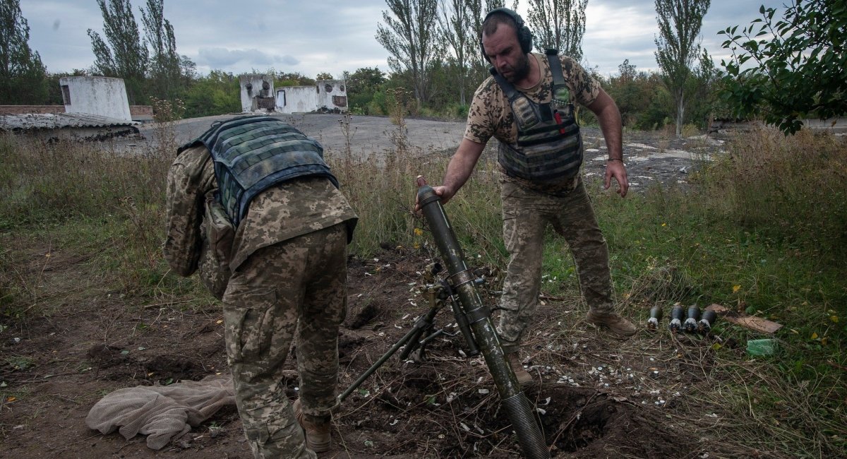Soldiers of the Ukrainian Armed Forces fire 82-mm Bulgarian-made mines from a UPIK-82 mortar at russian occupiers near Bakhmut, October 2022