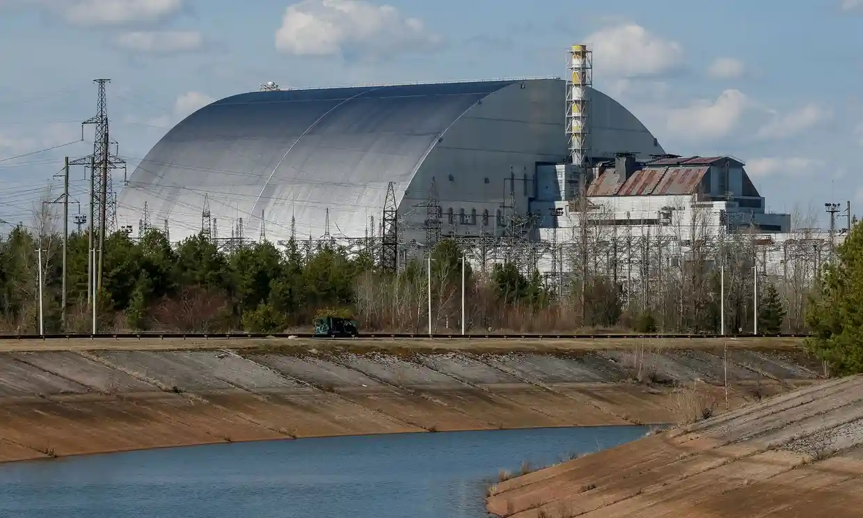 General view of the new safe confinement structure over the old sarcophagus covering the damaged fourth reactor at the Chernobyl Nuclear Power Plant, Defense Express