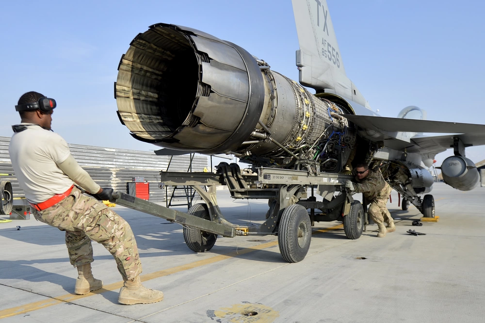 U.S. Air Force airmen perform F-16 maintenance at Bagram Air Field, Afghanistan, 2014