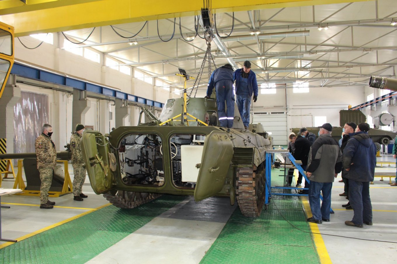 2S9 Nona turret is being installed on a BMP or BRM vehicle