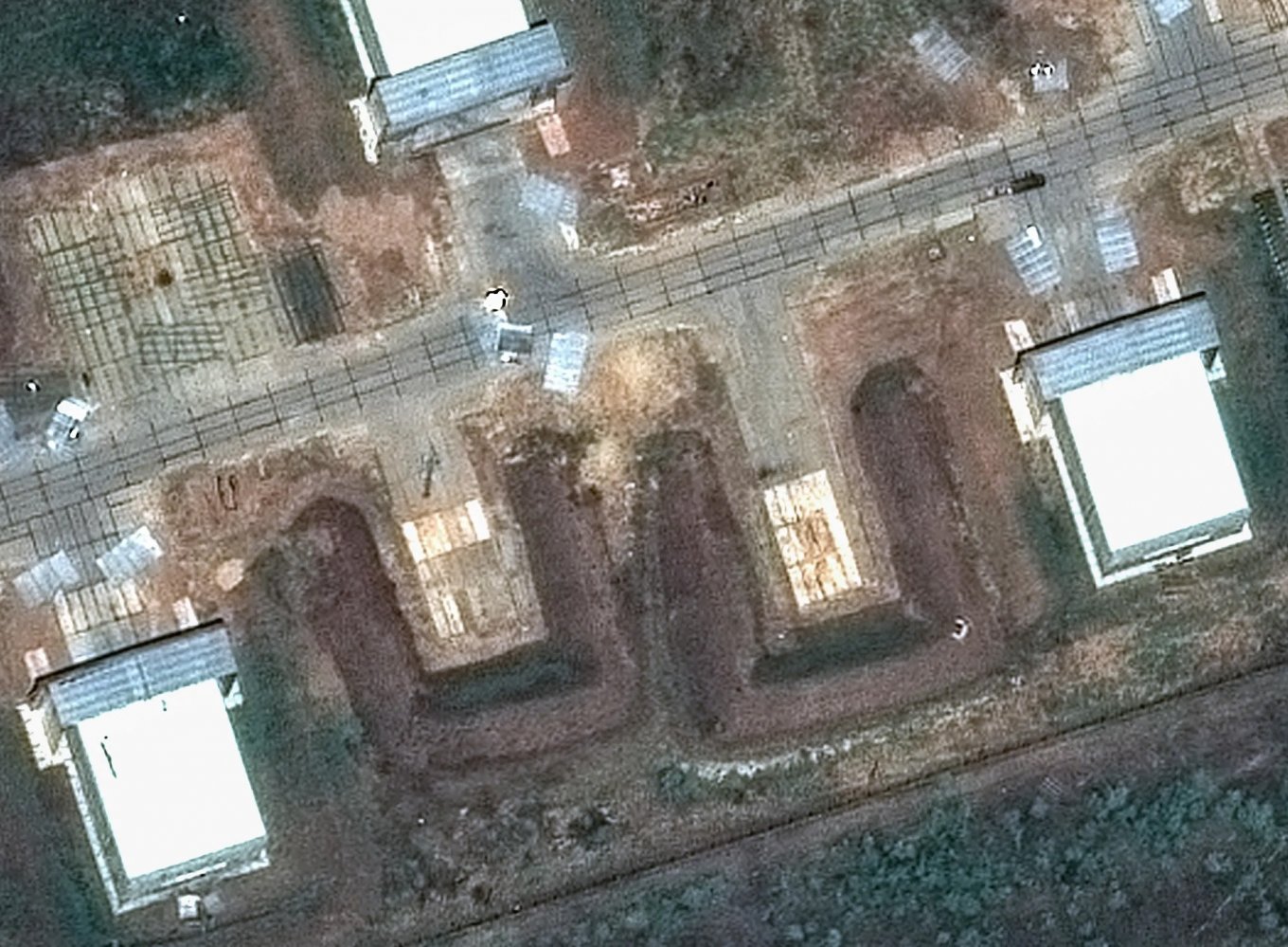Satellite Images Reveal How Ukrainian Drones Breach russia's New Concrete Aircraft Shelters to Destroy Fighter Jets Inside
