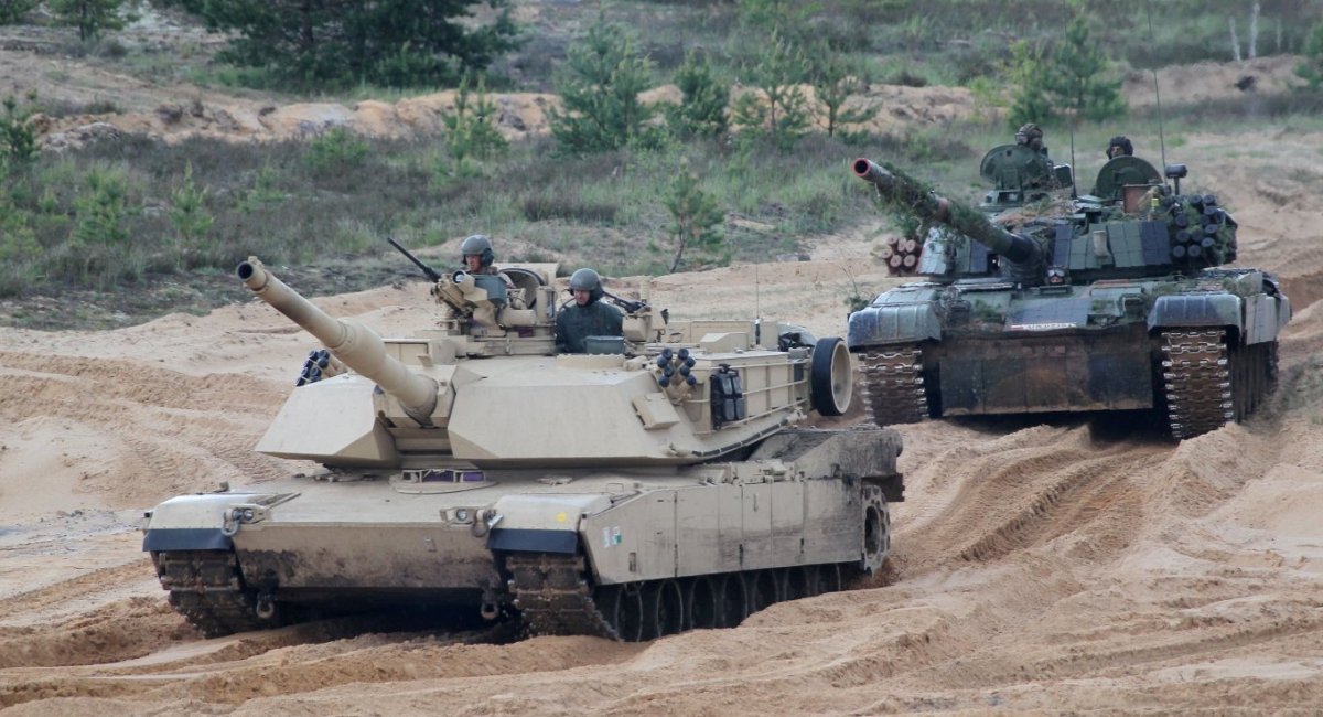 American tank M1A2 Abrams and Polish tank PT-91 Twardy during maneuvers of NATO units, Defense Express