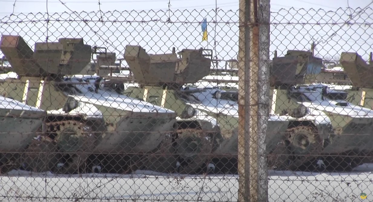 MT-LB-AT armored vehicle with a DShK machine gun turret in storage / Defense Express / Ukraine's Defense Ministry Reports 1,500 Armored Vehicles Returned to the Army, What This is About