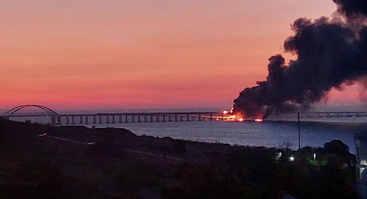 The Crimean Bridge on fire Defense Express The UK Defense Intelligence: Ukrainian Strikes Expose Gaps in russian Air Defenses, Prompting Retaliatory Missile Attacks