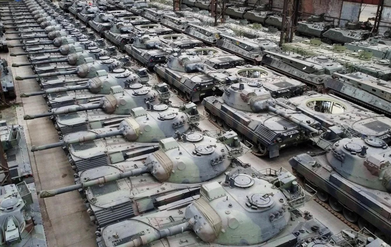 German Leopard 1 tanks in the hangar of the OIP Land Systems, January 2023, Belgium Defense Express The Very First Belgian Leopard 1 Tanks Left Tournai for Ukraine on Monday, It Is Unknown Who Donated Them