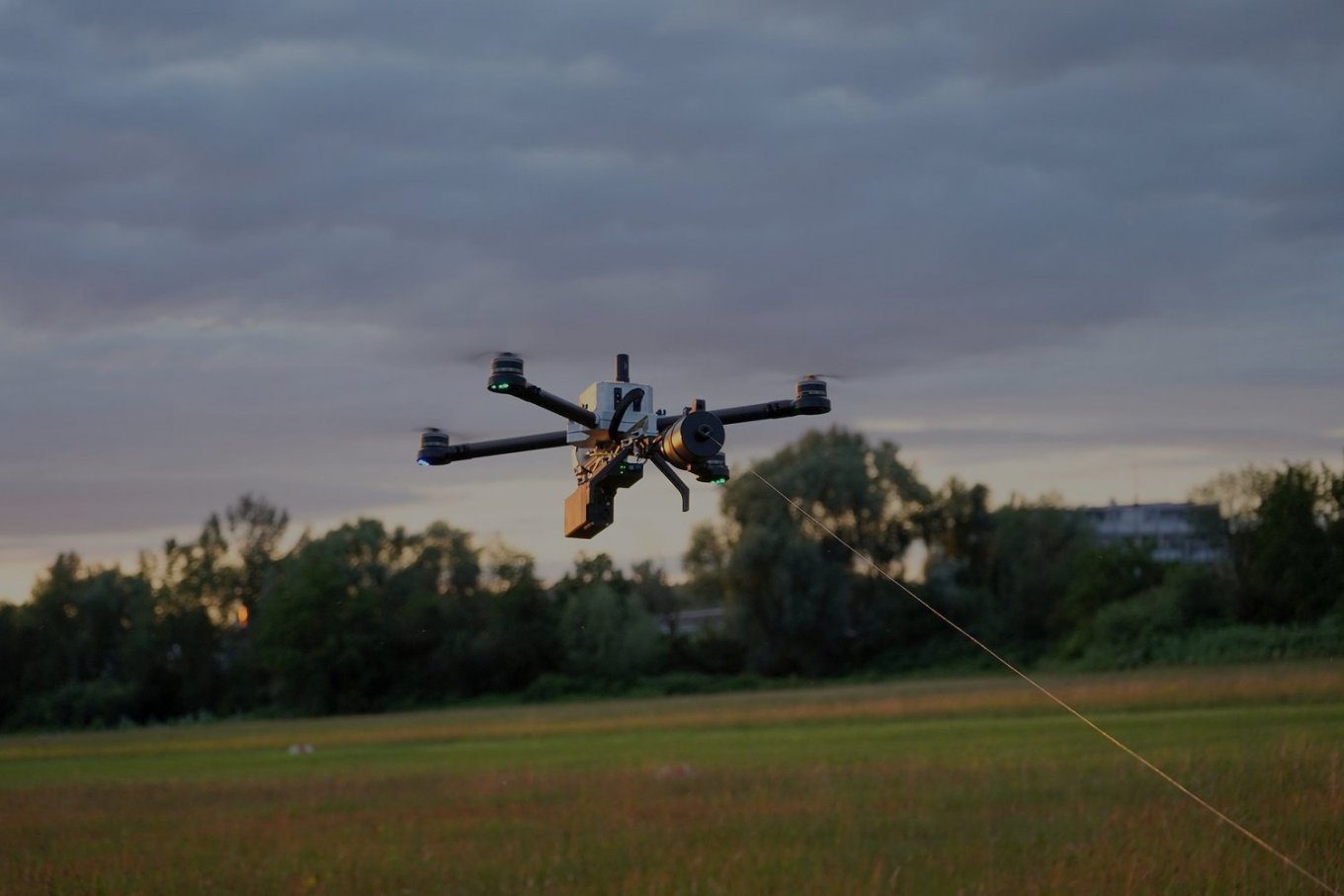 Highcat HCX drone controlled via an optic fiber wire / Defense Express / Wired FPV Drones on Optic Fiber: a Dead End, a Band Aid, or a New Technological Breakthrough