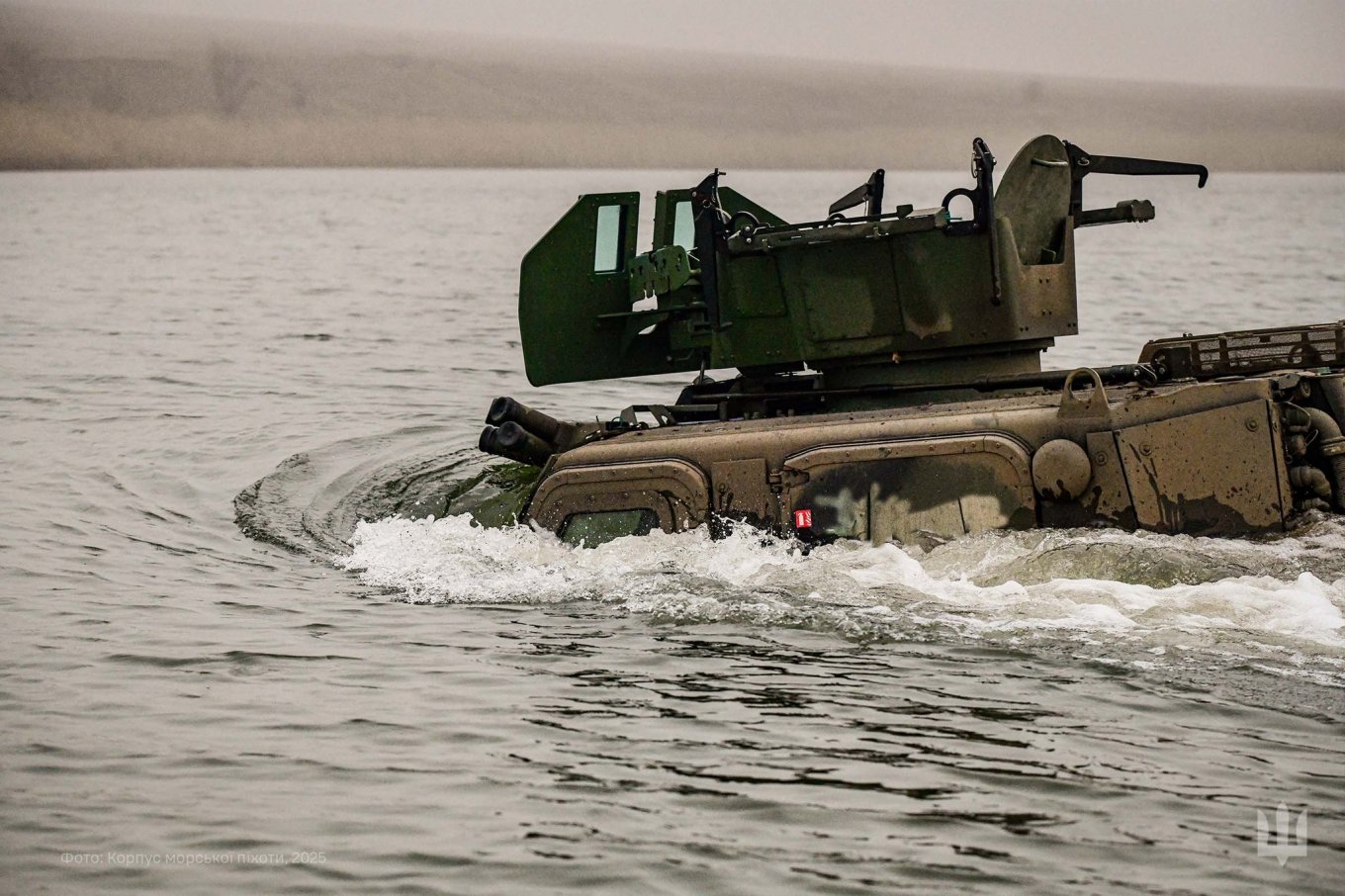 Naval infantry units practiced maneuvering heavy equipment across water obstacles in preparation for complex battlefield scenarios Defense Express Crossing the Line: Ukrainian Marines Test Rapid Mobility Over Water