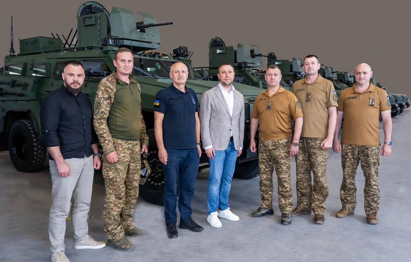 Representatives of Urkainian companies and the National Guard of Ukraine during the Novator-2 batch handover ceremony / Defense Express / Type of EW Dome for Novator-2 Armored Vehicle Revealed: AD Kraken Counter FPV F3