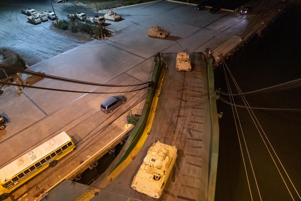 A convoy of Bradley Fighting Vehicles load onto the ARC Integrity Jan. 25, 2023, at the Transportation Core Dock in North Charleston, South Carolina, Defense Express