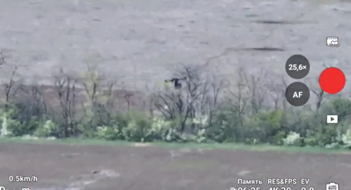 Ukrainian heavy drone equipped with a machine gun targeting russian forces