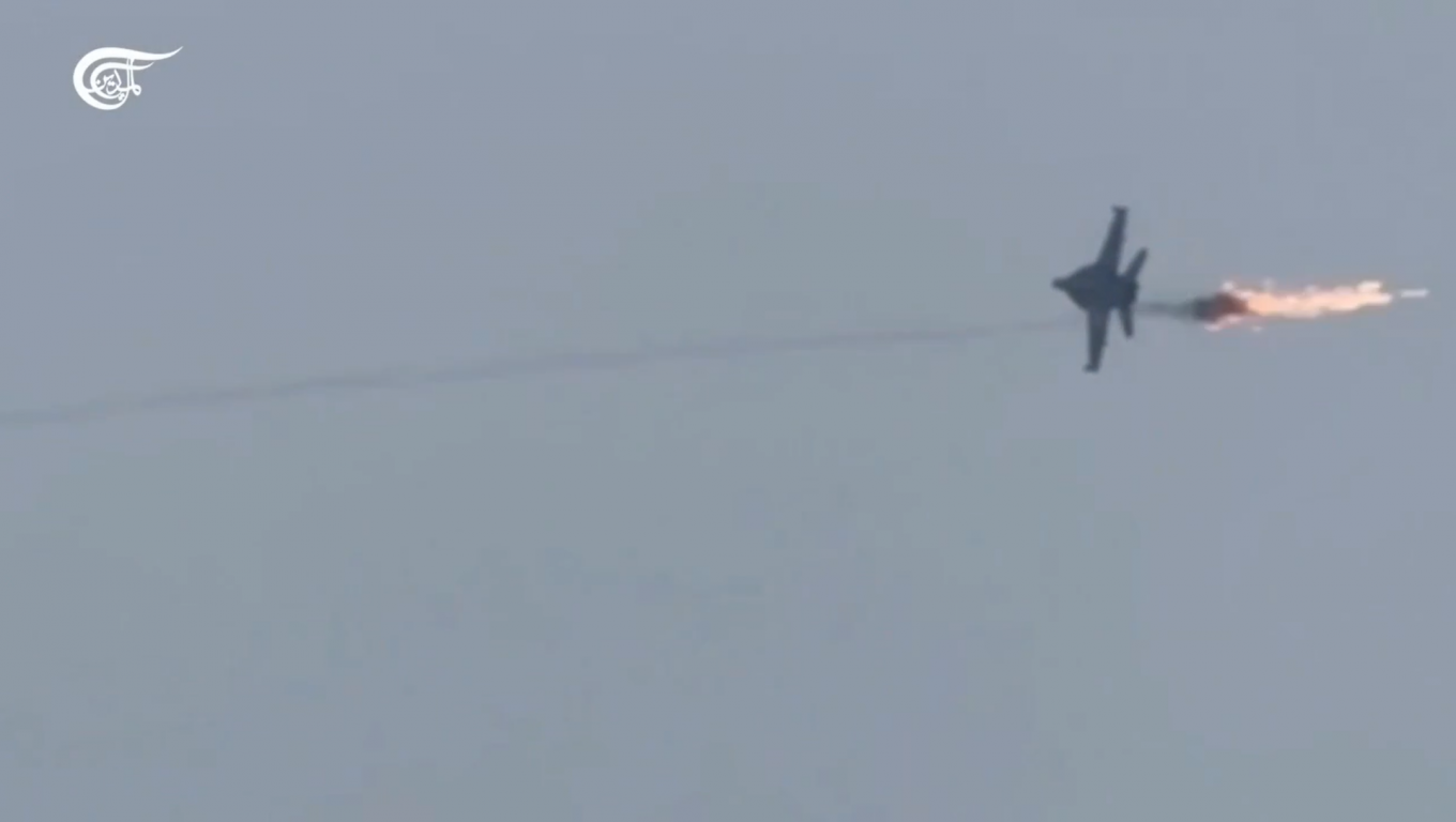 Moment of MANPADS missile explosion near F/A-18 Hornet