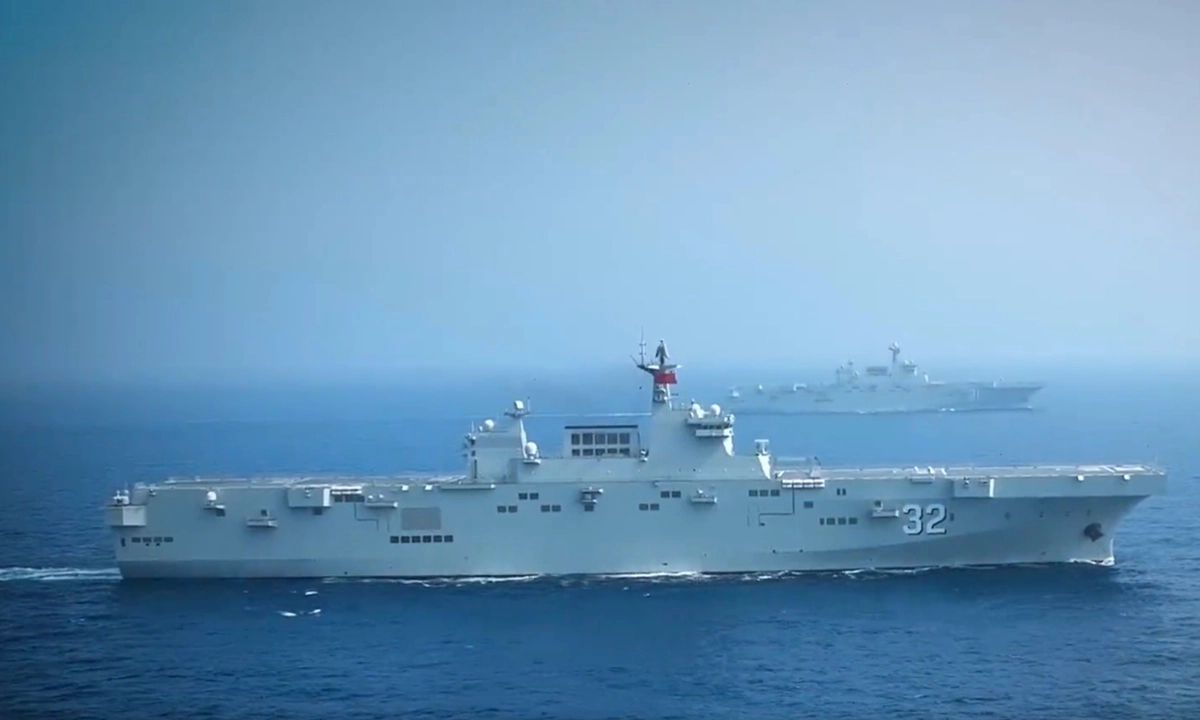 Two Chinese Type 075 multi-role landing ships