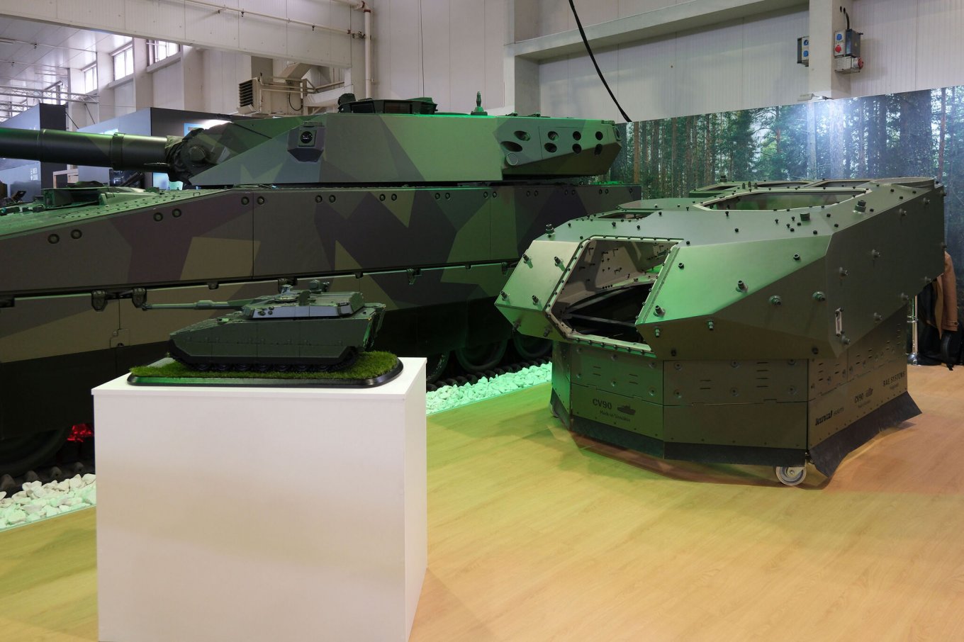 New CV90120 version mockups (on pedestal) and turret for it (right). Behind — old light tank variant / Photo credit: Koval Systems