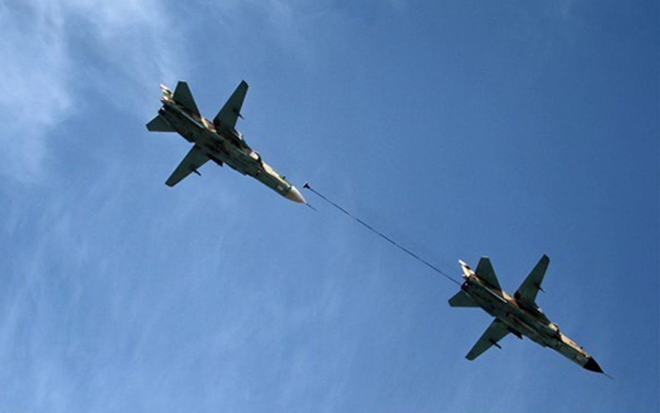 iranian pilots exercise in-flight refuelling of their Su-24MK