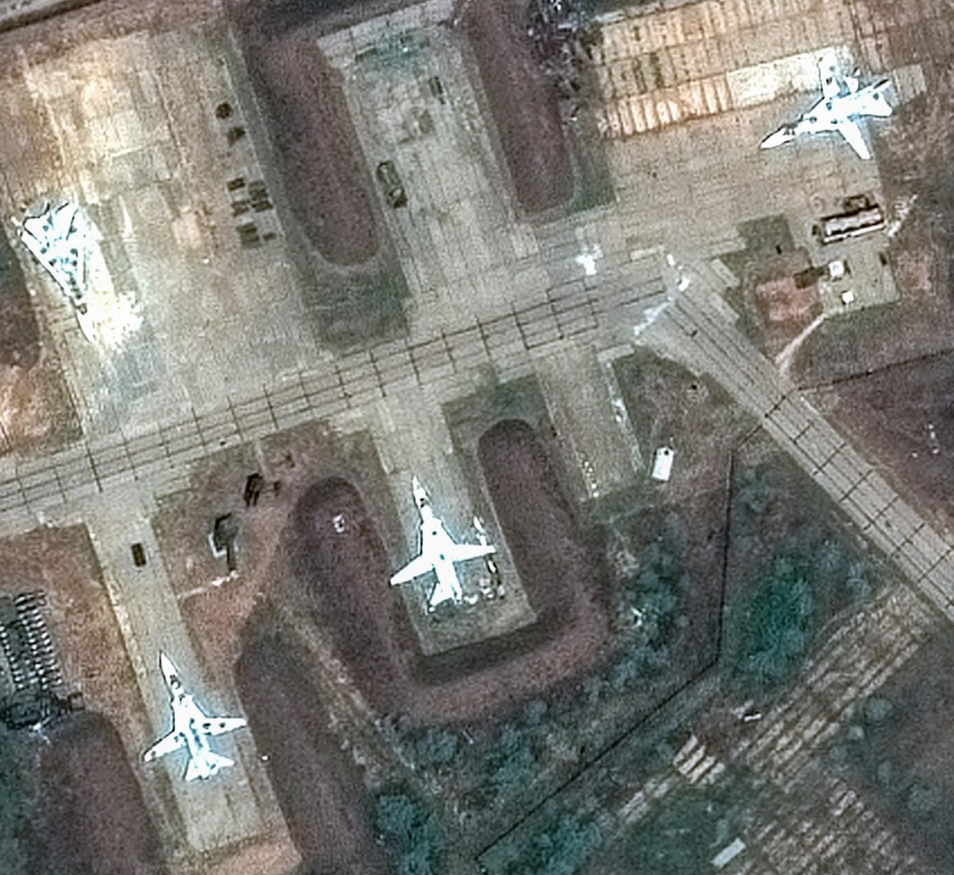 Satellite Images Reveal How Ukrainian Drones Breach russia's New Concrete Aircraft Shelters to Destroy Fighter Jets Inside