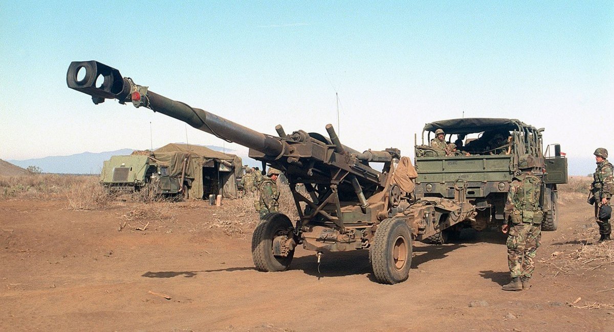 American military next to an M198 howitzer / Photo credit: LCPL Dustin W. Senger, USMC
