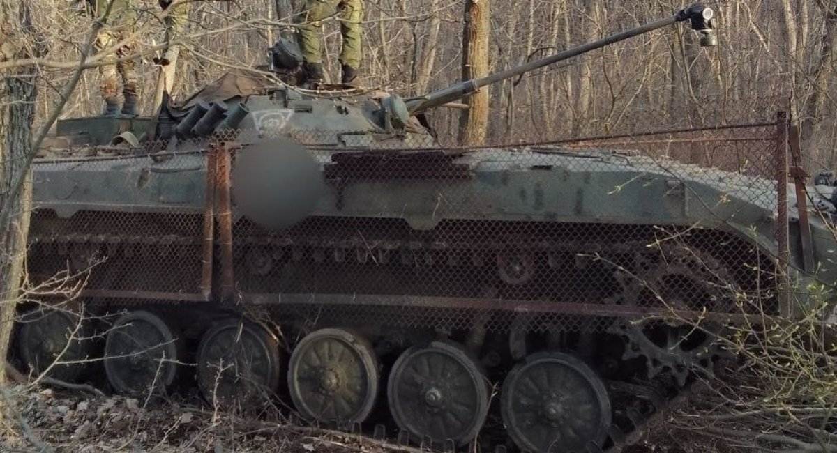russia's BMP-2 with chain link net 