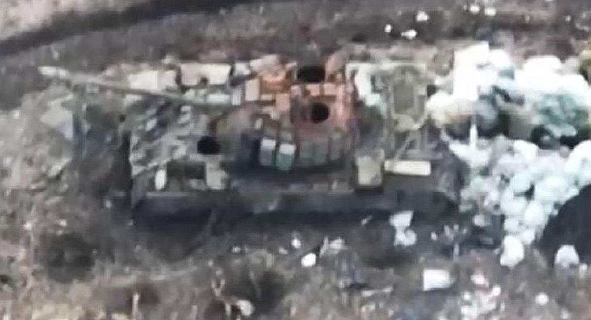 The russian T-54 with explosive reactive armor tiles, identified by the Russo-Ukrainian Warspotting website / Still frame credit: the Shadow airreconnaissance unit of the Ukrainian Defense Forces