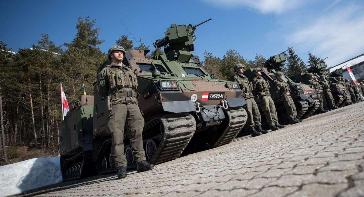 Austrian military next to their BvS-10 tracked tractors / Open source illustrative photo