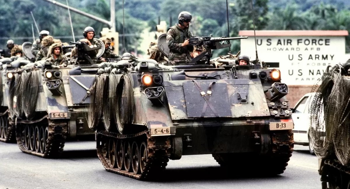 Illustrative photo: US troops mounted on M113 armored personnel carriers / Photo credit: Getty Images