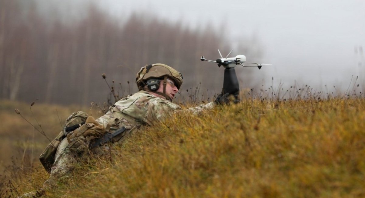 U.S. Army soldier prepares to launch drone / Photo credit: U.S. Army