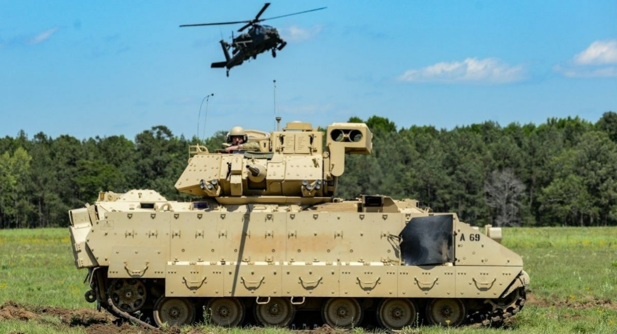 The M2A2 Bradley infantry fighting vehicle and the AH-64D Apache helicopter are candidates to be retired from service in the U.S. Army / Photo credit: U.S. Department of Defense