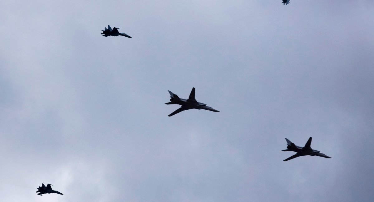 Two Tu-22M3 bombers accompanied by Su-35 fighters of the russian Air Force fly during russian-belarusian exercises at a training ground in belarus, February 19, 2022 / Photo credit: AP/Alexander Zemlianichenko