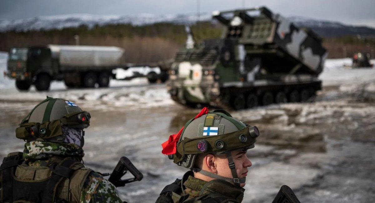 Soldiers from the Finnish Defence Forces stand in front of a M270 Multiple Launch Rocket System during the international military exercise Cold Response 22, at Setermoen, Norway, on March 22. JONATHAN NACKSTRAND/AFP VIA GETTY IMAGES