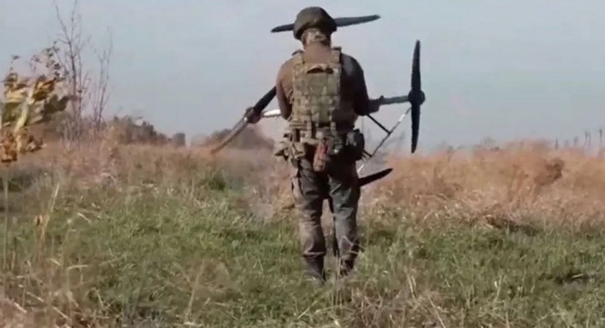 Ukrainian soldier carrying a Baba Yaga-type attack hexacopter for a combat mission / Open-source photo