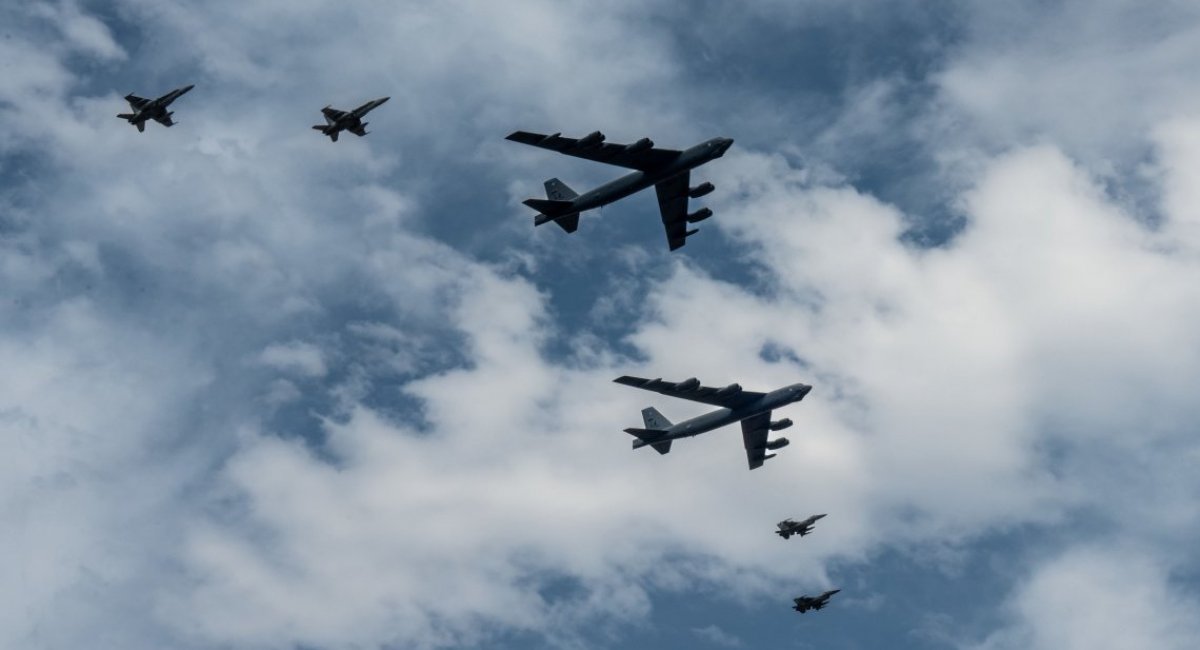 US Air Force B-52 strategic bombers accompanied by fighters / / U.S. Air Force Photo by Senior Airman Seth Watson