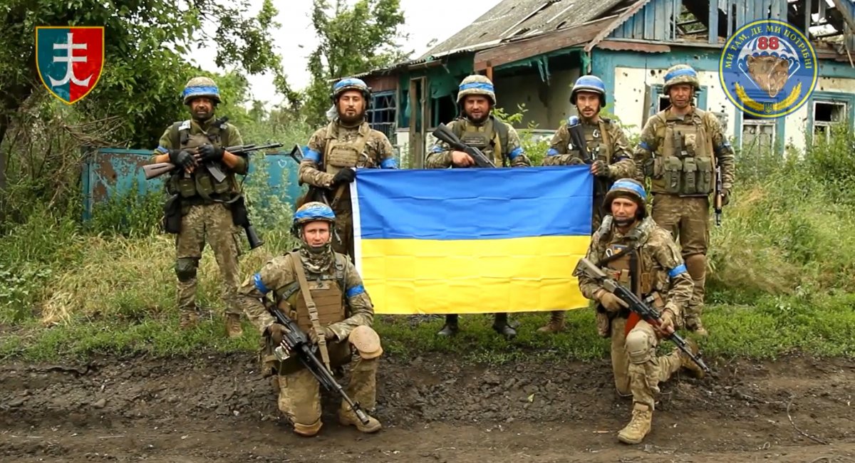 Ukrainian marines raise the Ukrainian flag over Storozheve village in Donetsk region