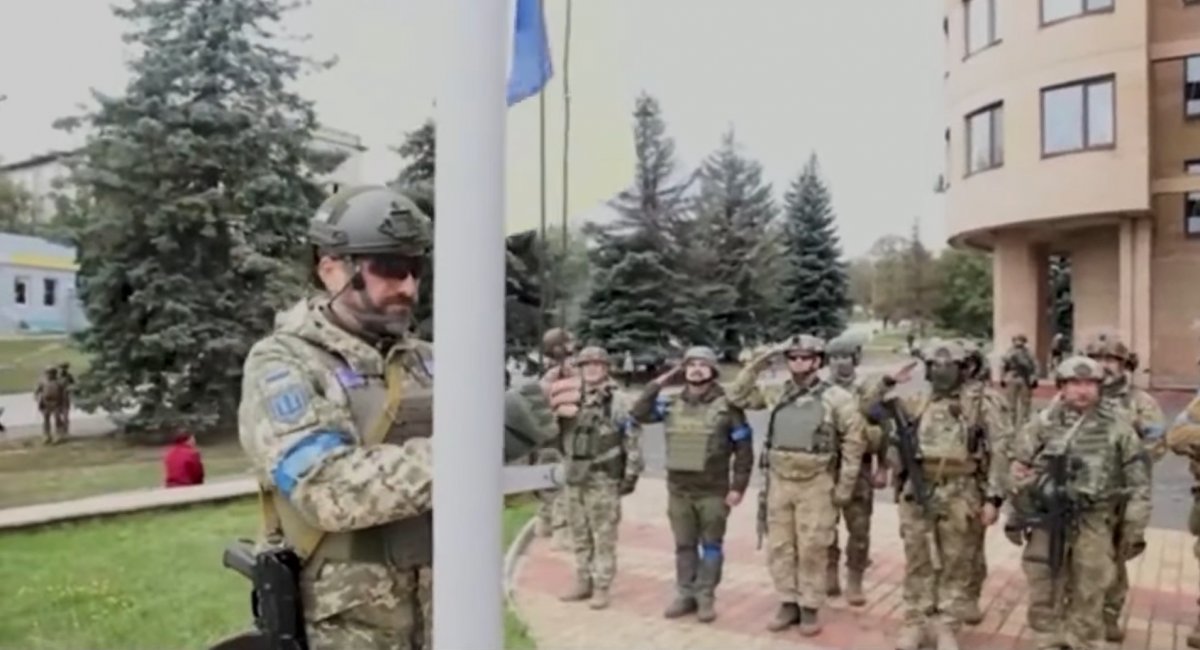 Ukraine's military raise the national flag of Ukraine over Balaklia, Kharkiv region