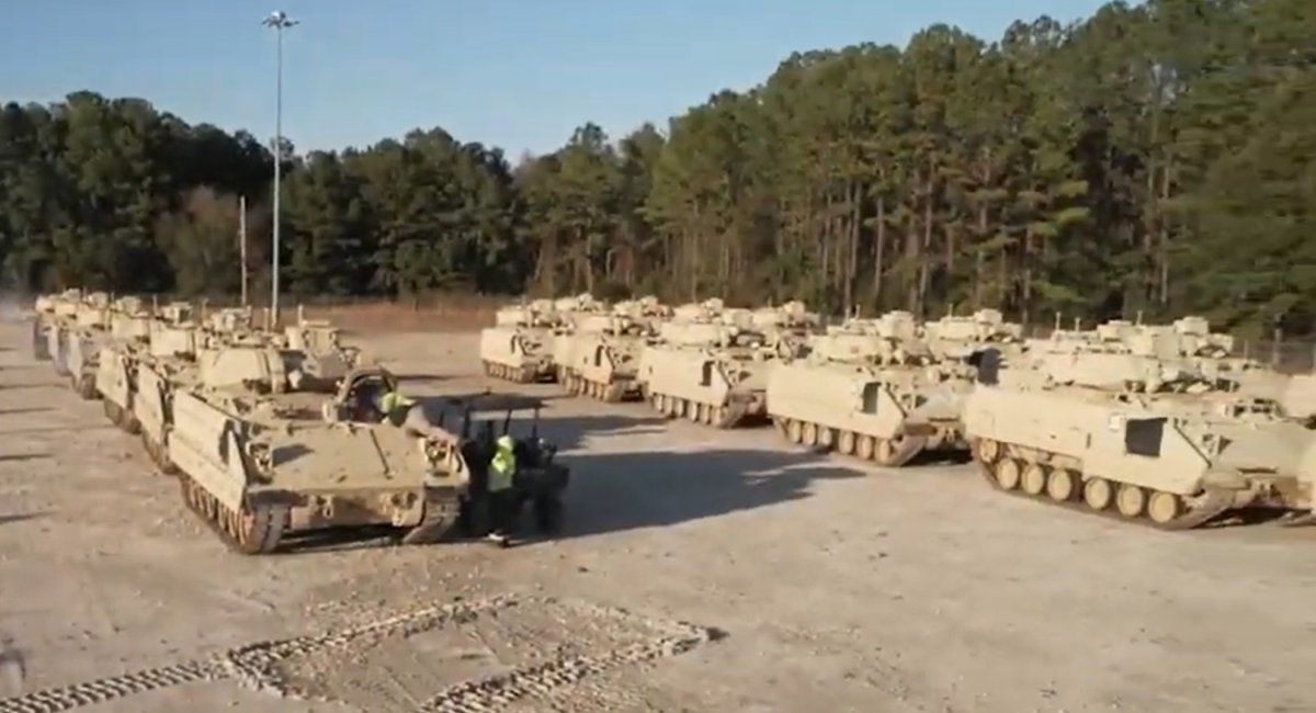 Bradley infantry fighting vehicles during loading in the USA / Screengrab of U.S. Transportation Command's video
