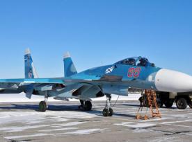 While the Admiral Kuznetsov Aircraft Carrier Rusts, russia Uses Its Su-33 Fighters to Escort Tu-95MS Bombers from the Olenya Airbase  