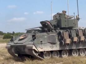 Five Ground Robots on One Bradley: U.S. Army Is Testing New Way to Deploy Drone Swarms