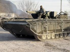 ​China Replicates Ukrainian Anti-Drone Armor For Tanks With a Futuristic Touch
