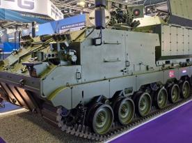 ​Why the MWS120 Ragnarok Mortar on the ACSV G5 Was Spotted at the DSEI 2025 Exhibition with Norwegian, Dutch, and Ukrainian Flags