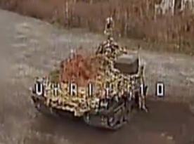 Ukrainian Drone Hunts Down russian Robotic Ammo Carrier (Video)