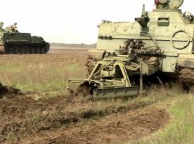 Ukrainian Forces Strike Rare russian GMZ-3 Minelayer Near Kupiansk (Video)