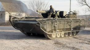 ​China Replicates Ukrainian Anti-Drone Armor For Tanks With a Futuristic Touch