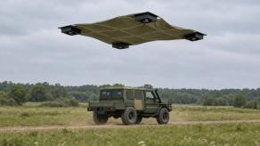 U.S. Startup Builds Flying Blanket to Hide Vehicles From Drones and Satellites, Four Drones Stretch IR/Radar-Blocking Cover Overhead