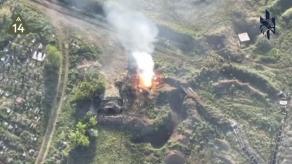 Ukrainian Kamikaze Drone Hits russian Armored Vehicles, Causing Powerful Explosion