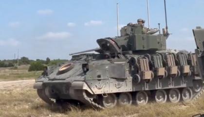 Five Ground Robots on One Bradley: U.S. Army Is Testing New Way to Deploy Drone Swarms