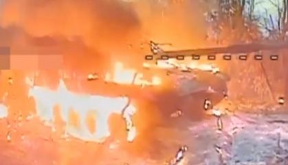 ​Ukrainian Drones Expose Camouflaged russian Tank and Set It Ablaze (Video)