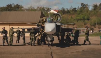 Sweden Cuts Gripen Turnaround From 15 to 10 Minutes Including Hot Rearming, Team of One Officer and Five Conscripts Does Full Refuel, Rearm and Relaunch 